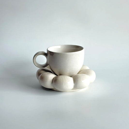 White ceramic cup and saucer