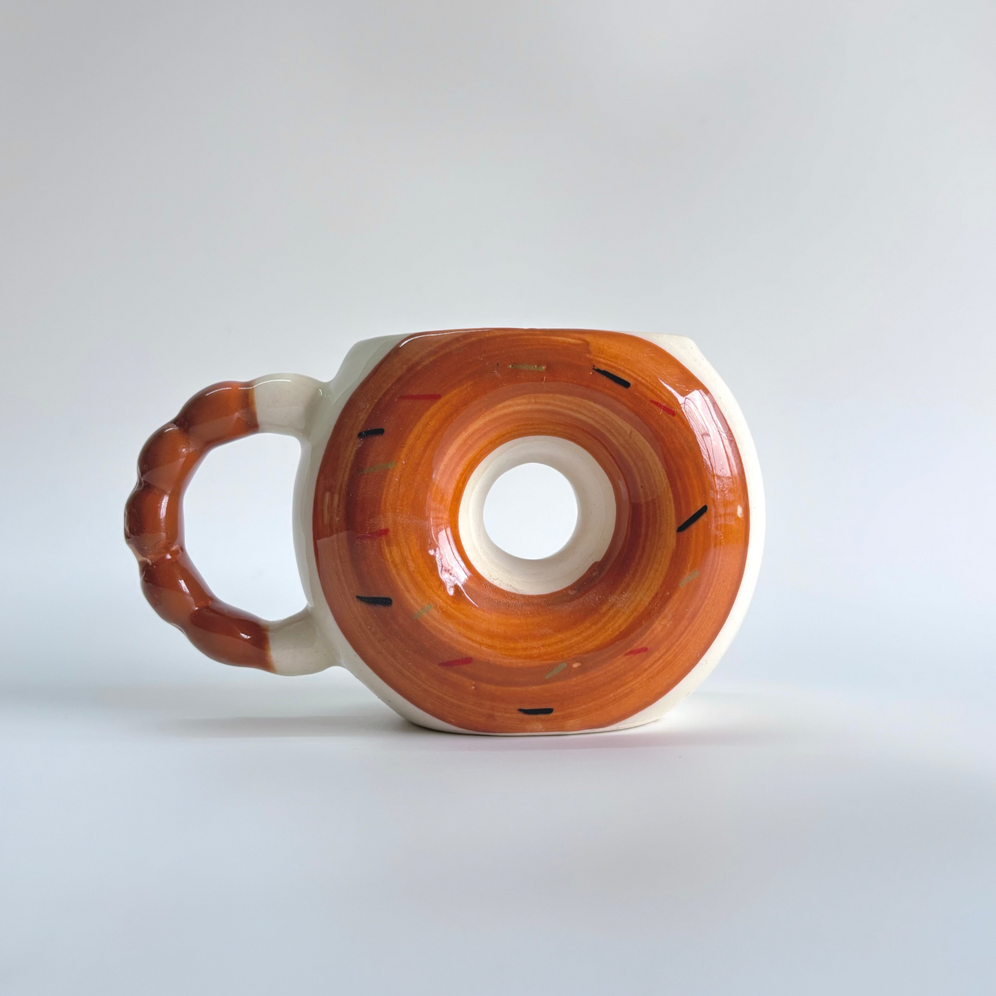 Ceramic mug with a unique design on a white background