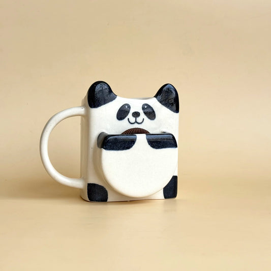Panda mug with a beige background