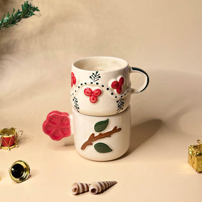 Stacked ceramic mugs with floral designs